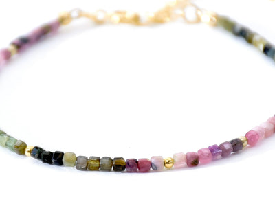 Dainty, lightweight bracelet made from tiny natural, genuine colorful Tourmaline beads in an ombre design. It is gold filled and luxury quality. Handmade jewelry. Perfect gift. Layer with other bracelets as a bracelet stack. Rare & unique