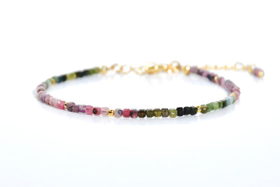 Dainty, lightweight bracelet made from tiny natural, genuine colorful Tourmaline beads in an ombre design. It is gold filled and luxury quality. Handmade jewelry. Perfect gift. Layer with other bracelets as a bracelet stack. Rare & unique