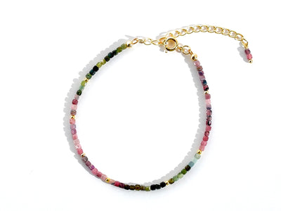 Dainty, lightweight bracelet made from tiny natural, genuine colorful Tourmaline beads in an ombre design. It is gold filled and luxury quality. Handmade jewelry. Perfect gift. Layer with other bracelets as a bracelet stack. Rare & unique