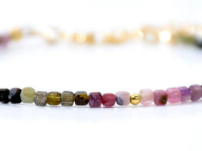 Dainty, lightweight bracelet made from tiny natural, genuine colorful Tourmaline beads in an ombre design. It is gold filled and luxury quality. Handmade jewelry. Perfect gift. Layer with other bracelets as a bracelet stack. Rare & unique