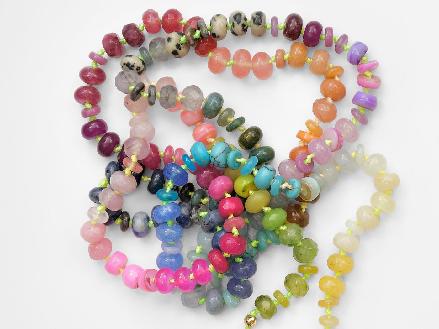 A rainbow multi-gemstone necklace that is handknotted & handcrafted. Made from natural semi precious gemstones. This necklace is sure to add a pop of color to any outfit