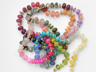 A rainbow multi-gemstone necklace that is handknotted & handcrafted. Made from natural semi precious gemstones. This necklace is sure to add a pop of color to any outfit