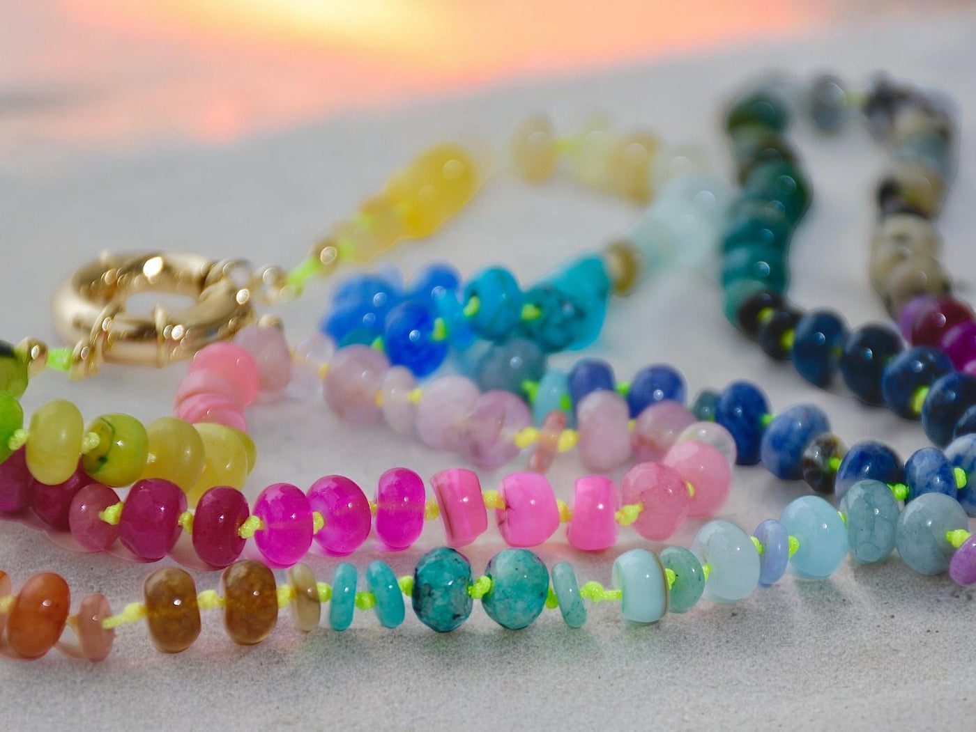 A rainbow multi-gemstone necklace that is handknotted & handcrafted. Made from natural semi precious gemstones. This necklace is sure to add a pop of color to any outfit