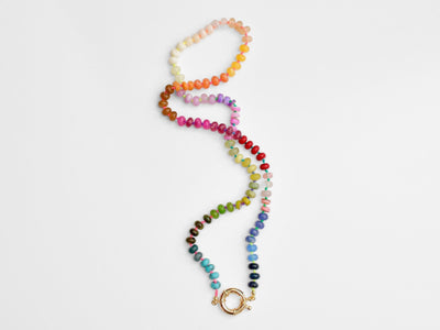 A rainbow multi-gemstone necklace that is handknotted & handcrafted. Made from natural semi precious gemstones. This necklace is sure to add a pop of color to any outfit