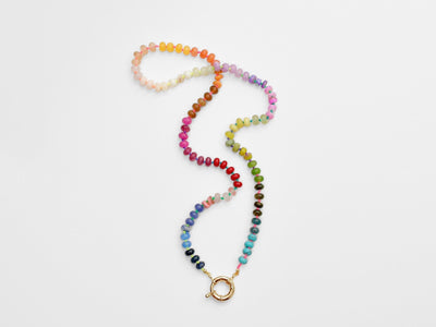 A rainbow multi-gemstone necklace that is handknotted & handcrafted. Made from natural semi precious gemstones. This necklace is sure to add a pop of color to any outfit