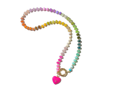 A rainbow multi-gemstone opal necklace that is hand-knotted Made from natural semi precious opal gemstones it features a hot pink heart pendant. It&#39;s feminine & girly w/ a hint of iridescence w/ the added glass shiny beads in between each gemstone.