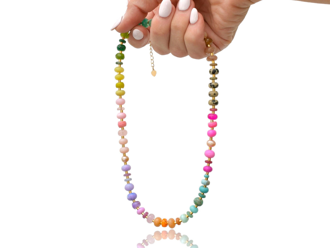 A rainbow multi-gemstone necklace that is handknotted & handcrafted. Made from natural semi precious gemstones. This necklace is sure to add a pop of color to any outfit