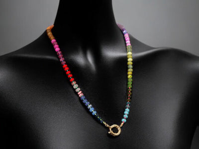 This multi gemstone necklace is handmade, featuring an array of vibrant, rainbow gemstones. From rich amethysts and fiery citrines to lush jades and serene chalcedony.