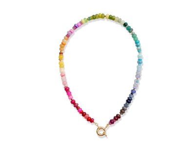 Multi mixed gemstone necklace in bright, jeweled colors . It features gold spacing tube beads that add a hint of shimmer and elegance to the overlook appeal.