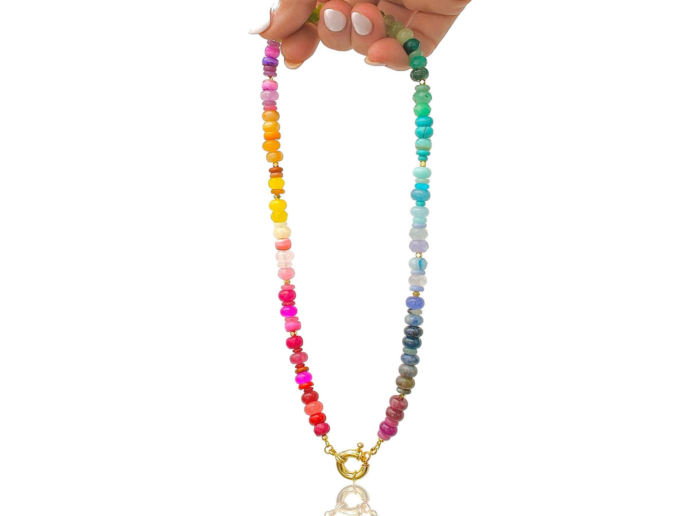 Multi mixed gemstone necklace in bright, jeweled colors . It features gold spacing tube beads that add a hint of shimmer and elegance to the overlook appeal.