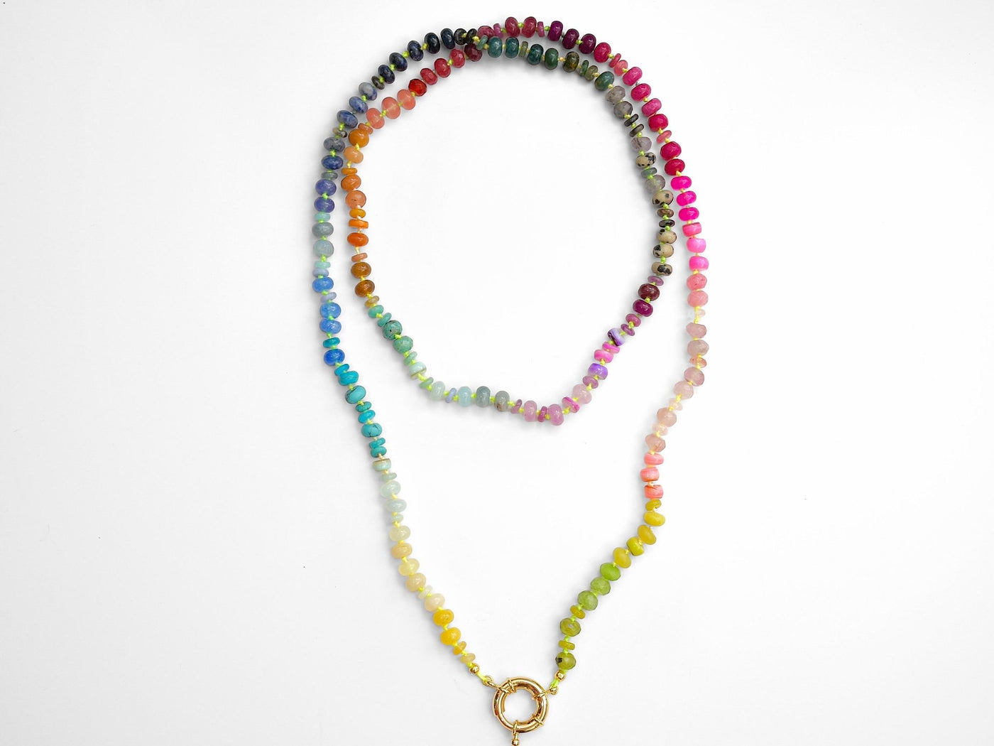 A rainbow multi-gemstone necklace that is handknotted & handcrafted. Made from natural semi precious gemstones. This necklace is sure to add a pop of color to any outfit