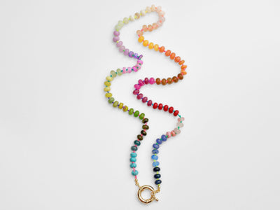 A rainbow multi-gemstone necklace that is handknotted & handcrafted. Made from natural semi precious gemstones. This necklace is sure to add a pop of color to any outfit