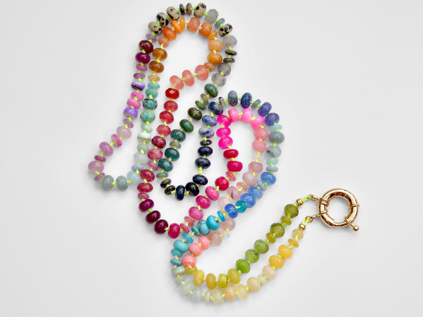 A rainbow multi-gemstone necklace that is handknotted & handcrafted. Made from natural semi precious gemstones. This necklace is sure to add a pop of color to any outfit