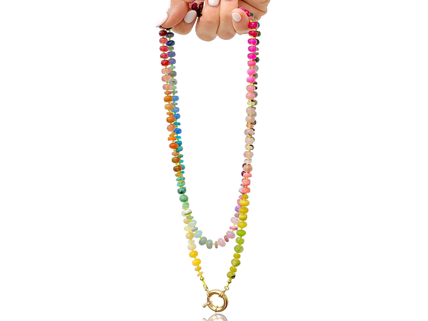 A rainbow multi-gemstone necklace that is handknotted & handcrafted. Made from natural semi precious gemstones. This necklace is sure to add a pop of color to any outfit