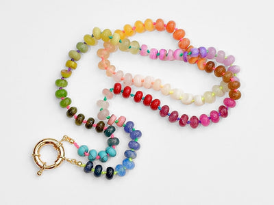 This multi gemstone necklace is handmade, featuring an array of vibrant, rainbow gemstones. From rich amethysts and fiery citrines to lush jades and serene chalcedony.