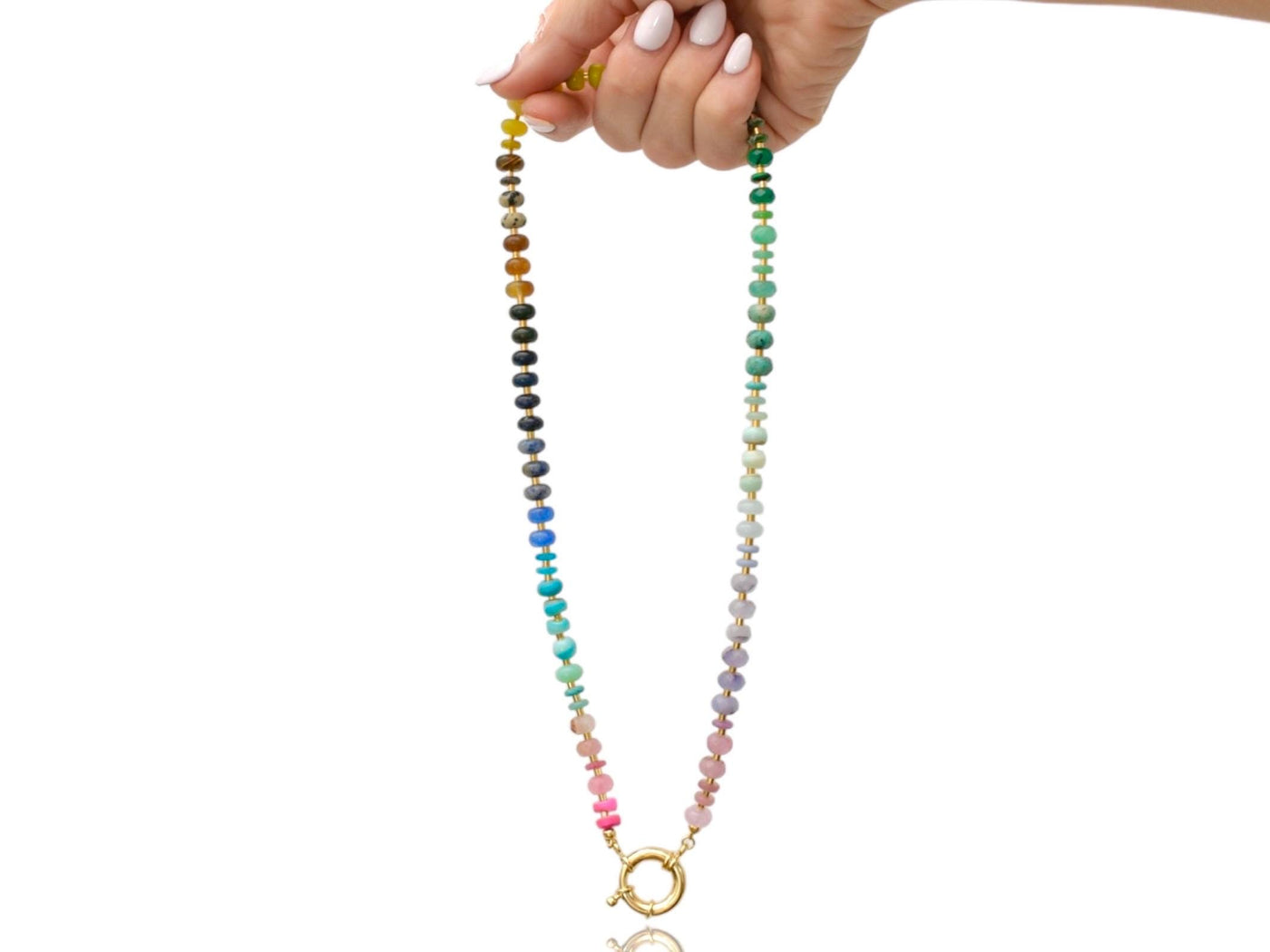 This multi gemstone necklace is handmade, featuring an array of vibrant, rainbow gemstones. From rich amethysts and fiery citrines to lush jades and serene chalcedony.