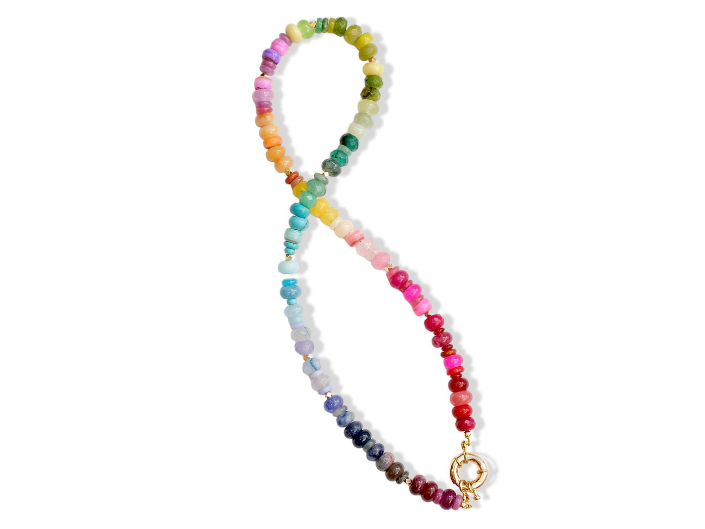 Multi mixed gemstone necklace in bright, jeweled colors . It features gold spacing tube beads that add a hint of shimmer and elegance to the overlook appeal.