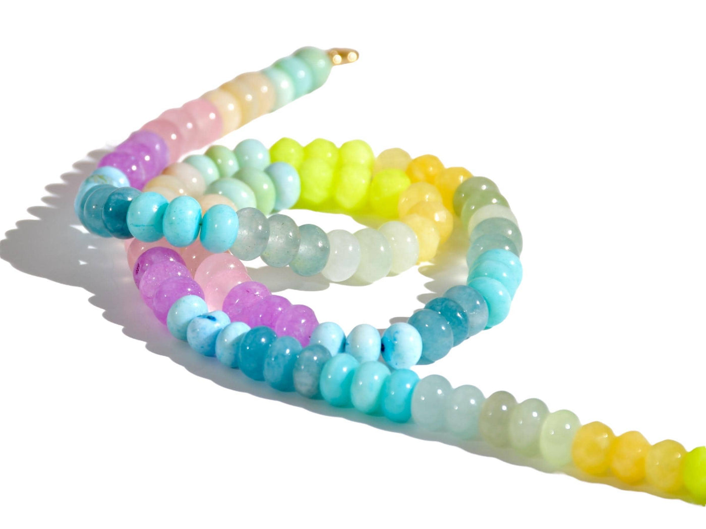 A Candy Colored Long Beaded Gem Necklace featuring opals, aquamarines, jades, rose quartz and pastel [rainbow beads. It&#39;s a beautiful Statement Necklace for the Summer in colors of mint blue, greens, purples and yellows.