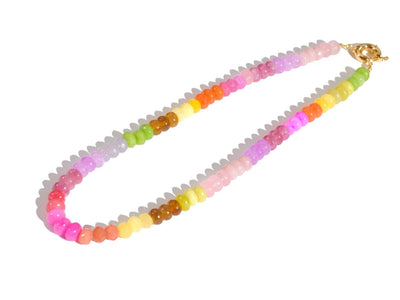 A Candy Colored Long Beaded Gem Necklace featuring amethysts, citrines, sunstone, jades, rose quartz & opal rainbow beads. It is a beautiful Boho Chic Statement Necklace for the Summer in bright neon pinks, purples, oranges, greens & yellows.