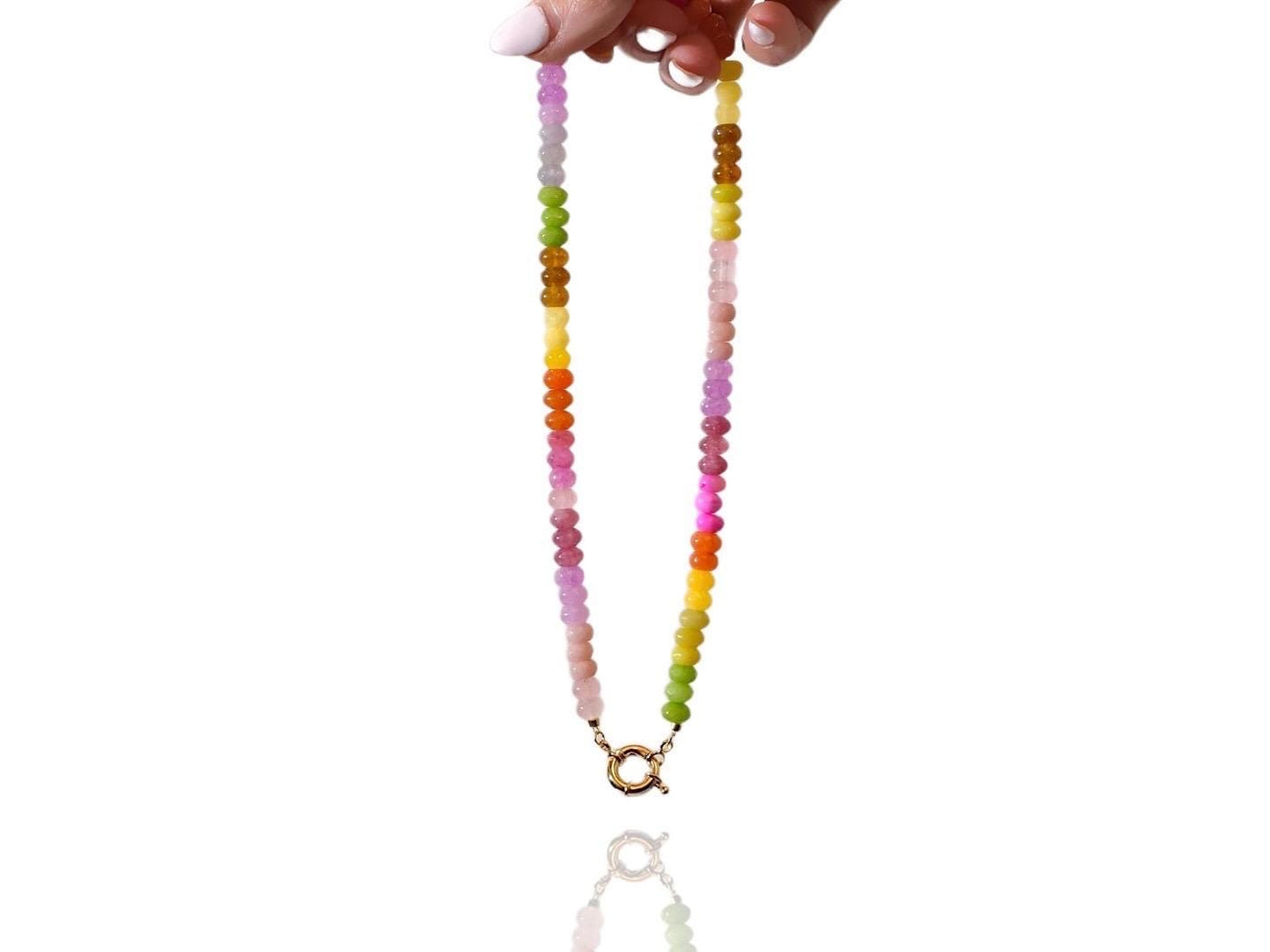 A Candy Colored Long Beaded Gem Necklace featuring amethysts, jades, rose quartz and opal rainbow beads. It is a beautiful Boho Chic Statement Necklace for the Summer in colors of bright neon pinks , purples, oranges, greens and yellows.