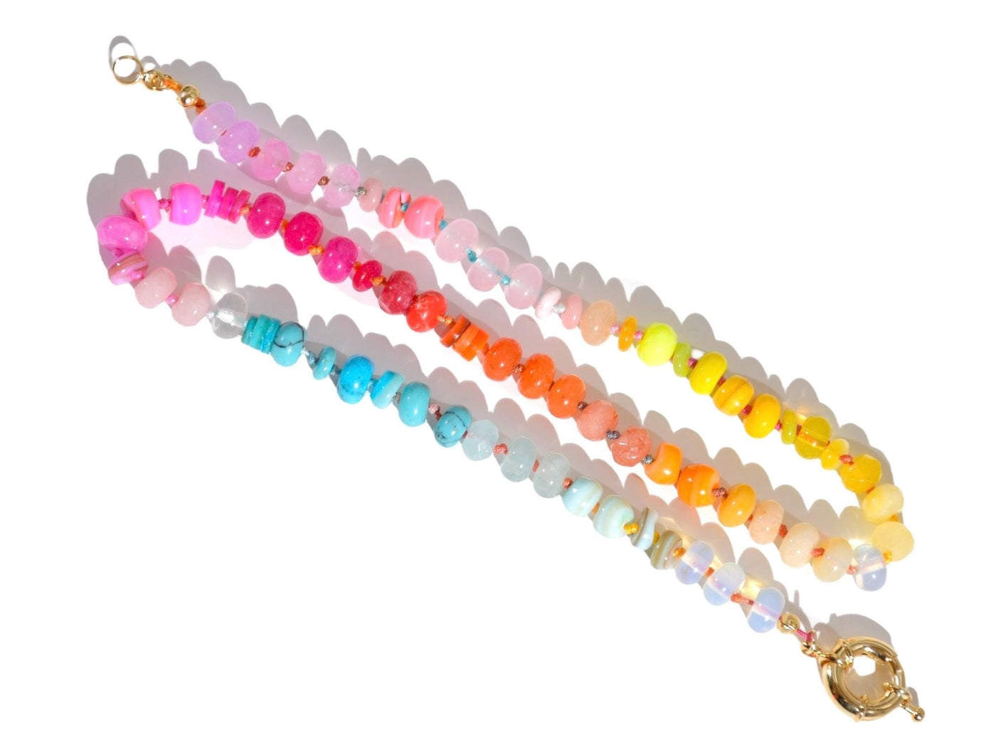 Candy Colored Long Beaded Gem Necklace featuring neon colored rainbow gemstones opal rainbow beads. It is a beautiful Boho Chic Statement Necklace for the Summer in colors of bright neon pinks , purples, oranges, turquoise and yellows.