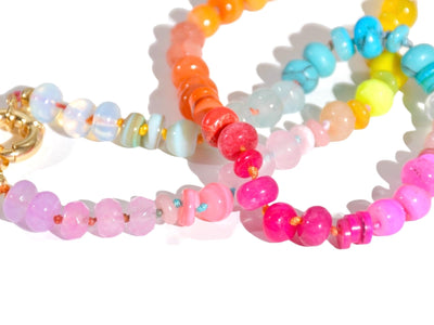 Candy Colored Long Beaded Gem Necklace featuring neon colored rainbow gemstones opal rainbow beads. It is a beautiful Boho Chic Statement Necklace for the Summer in colors of bright neon pinks , purples, oranges, turquoise and yellows.