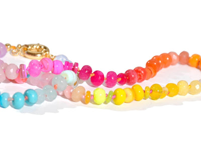 Candy Colored Long Beaded Gem Necklace featuring neon colored rainbow gemstones opal rainbow beads. It is a beautiful Boho Chic Statement Necklace for the Summer in colors of bright neon pinks , purples, oranges, turquoise and yellows.