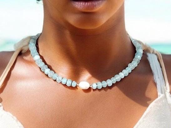 Light blue aquamarine Gem Necklace hand made with silver and gold spacer beads. It is a beautiful Boho Chic Statement Necklace for the Summer in colors of soft blue.