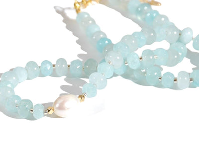 Light blue aquamarine Gem Necklace hand made with silver and gold spacer beads. It is a beautiful Boho Chic Statement Necklace for the Summer in colors of soft blue.