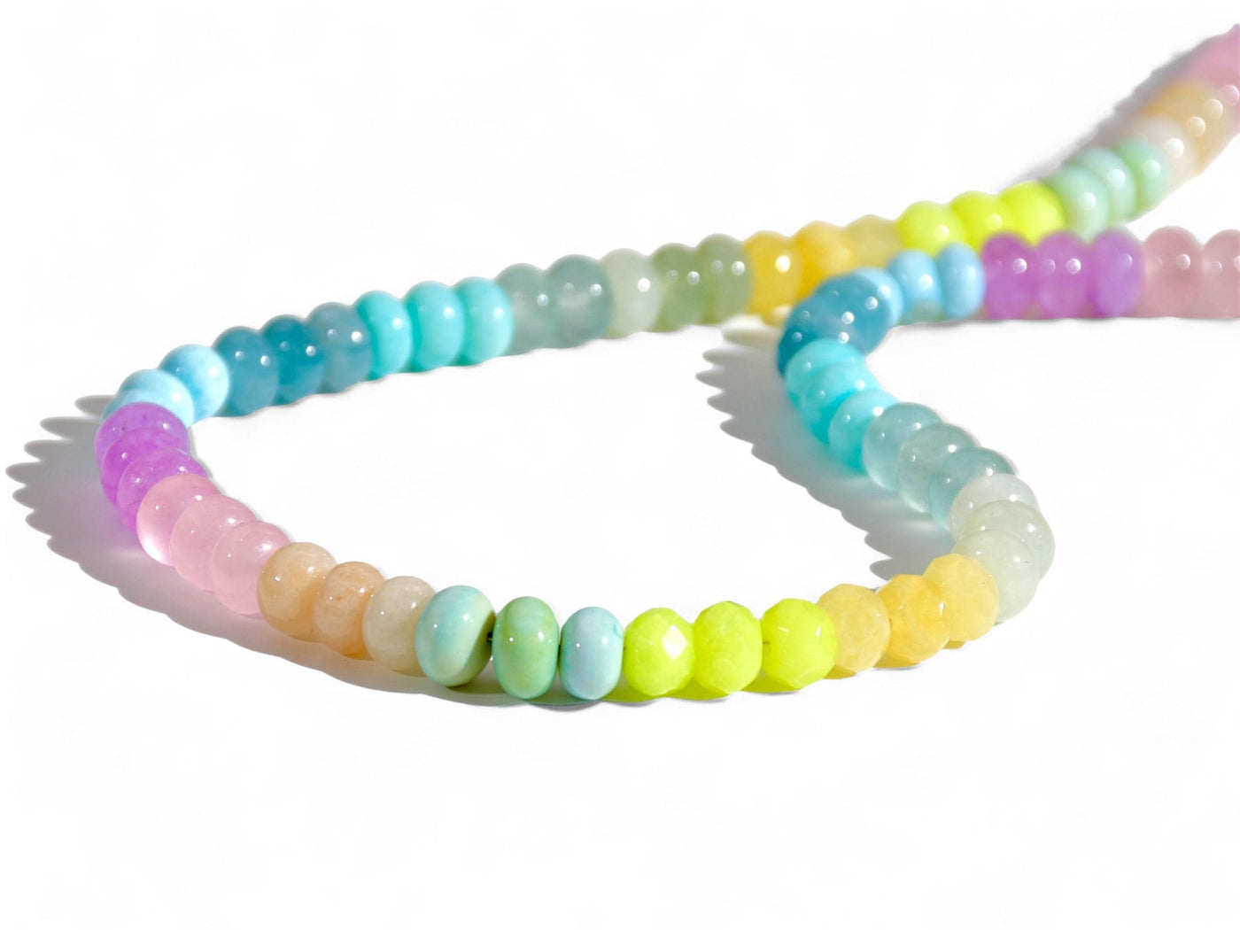 A Candy Colored Long Beaded Gem Necklace featuring opals, aquamarines, jades, rose quartz and pastel [rainbow beads. It&#39;s a beautiful Statement Necklace for the Summer in colors of mint blue, greens, purples and yellows.