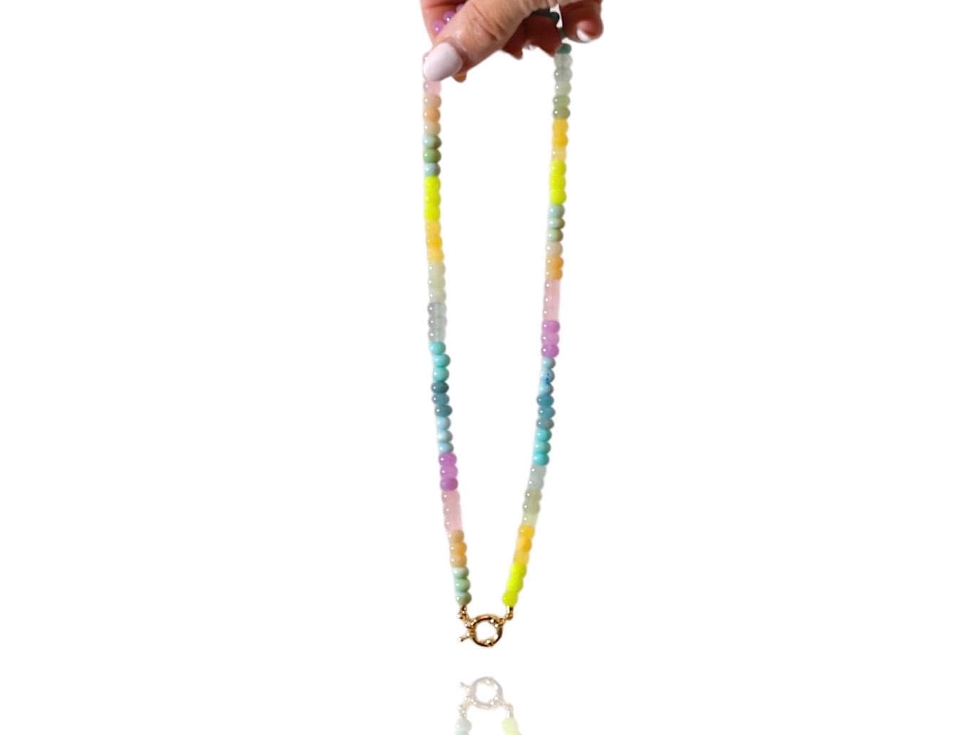 A Candy Colored Long Beaded Gem Necklace featuring opals, aquamarines, jades, rose quartz and pastel [rainbow beads. It&#39;s a beautiful Statement Necklace for the Summer in colors of mint blue, greens, purples and yellows.