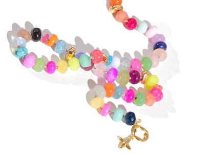 A Candy Colored Beaded Gemstone Choker Necklace featuring amethysts, citrines, sunstone, jades, rose quartz & opal rainbow beads. It is a beautiful Boho Chic Statement Choker for the Summer in bright neon pinks, purples, oranges, greens & yellows.