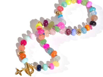 A Candy Colored Beaded Gemstone Choker Necklace featuring amethysts, citrines, sunstone, jades, rose quartz & opal rainbow beads. It is a beautiful Boho Chic Statement Choker for the Summer in bright neon pinks, purples, oranges, greens & yellows.