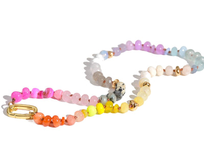 Candy Colored Long Beaded Gem Necklace featuring neon colored rainbow gemstones and opal rainbow beads. It is a beautiful Boho Chic Statement Necklace for the Summer in colors of bright neon pinks , purples, oranges, pastels and yellows.