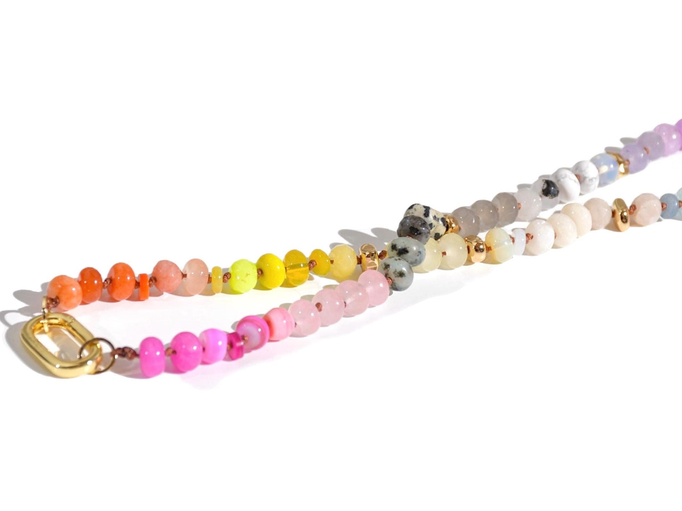 Candy Colored Long Beaded Gem Necklace featuring neon colored rainbow gemstones and opal rainbow beads. It is a beautiful Boho Chic Statement Necklace for the Summer in colors of bright neon pinks , purples, oranges, pastels and yellows.