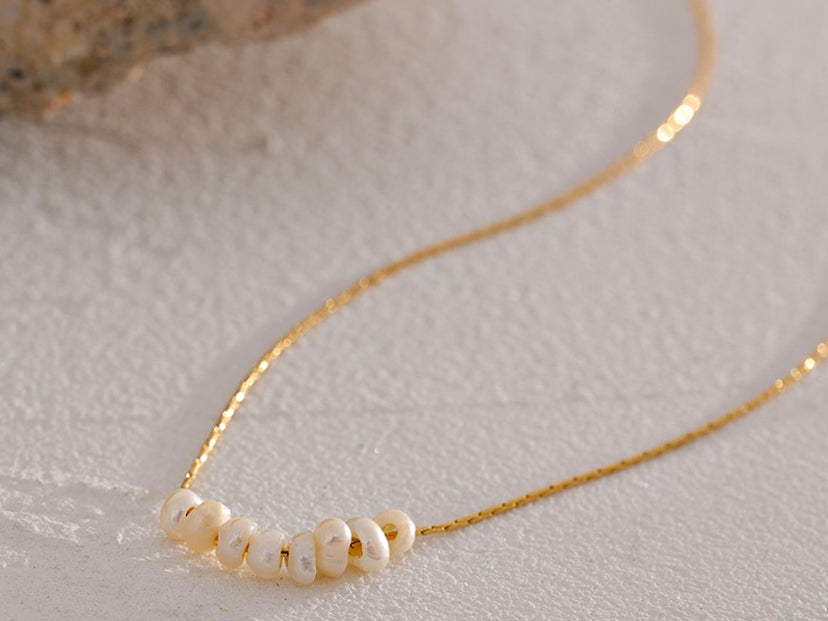 Gorgeous fine gold jewelry that is water proof, waterproof, tarnish proof, and 18k karat gold coated.  High quality high end jewelry.  Simple dainty trendy gold necklaces with freshwater pearl pendant.  Jewelry and gift ideas for her.  Jewelry for wife and girlfriend Christmas present 